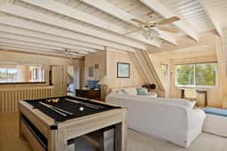 4BR Lakefront Vibes Getaway | Dock, Spa & Games - Image 5